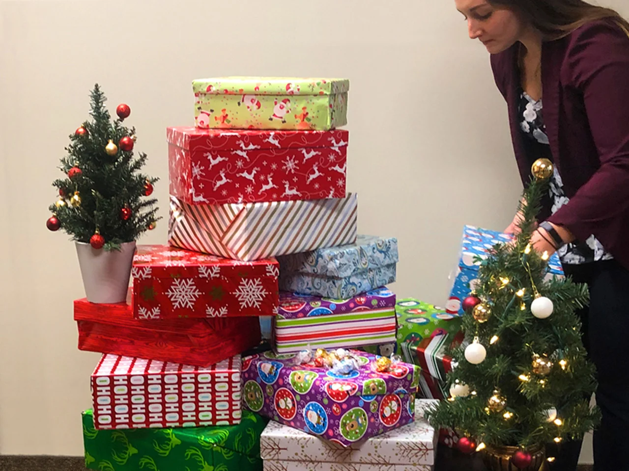 Christmas presents near a tree